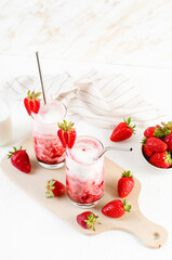 Korean Strawberry Milk, Strawberry Milkshake with Pureed Fresh Berries, Refreshing Drink on Bright Background