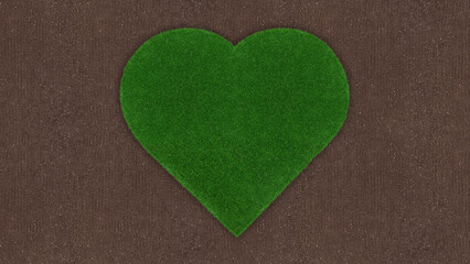 Heart shape of meadow green grass surface isolated on soil ground surface. Turf and terrain blank...