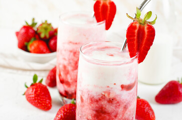 Korean Strawberry Milk, Strawberry Milkshake with Pureed Fresh Berries, Refreshing Drink on Bright Background