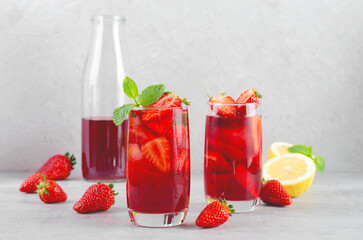 Strawberry Drink, Refreshing Summer Cocktail, Lemonade, Iced Tea, Red Cold Drink on Bright Background