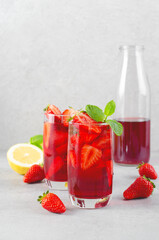Strawberry Drink, Refreshing Summer Cocktail, Lemonade, Iced Tea, Red Cold Drink on Bright Background