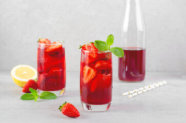 Strawberry Drink, Refreshing Summer Cocktail, Lemonade, Iced Tea, Red Cold Drink on Bright Background