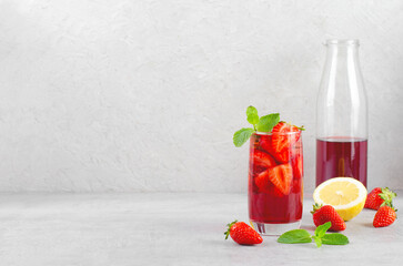 Strawberry Drink, Refreshing Summer Cocktail, Lemonade, Iced Tea, Red Cold Drink on Bright Background