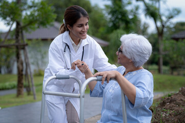 Retirement woman with a caregiver in a nursing home, nursing home, retirement life insurance.