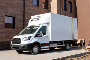 a white blank cargo delivery truck template and copy space for commercial information