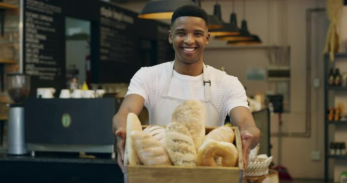 Bakery, basket and face of man baker in cafe ready for serving food, bread and pastry in small business. Restaurant, coffee shop and portrait of male waiter smile with baked product, breads and roll
