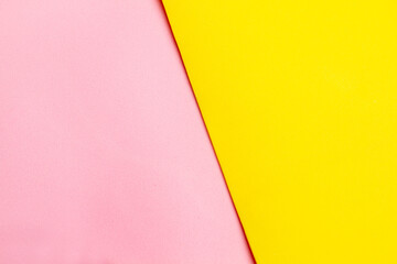 Fondo textura de color rosa y amarillo. Vista superior y de cerca. Copy space