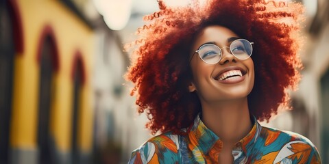young afro woman smiling in the street, happiness - obrazy, fototapety, plakaty