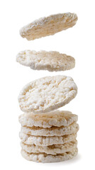 Puffed rice cakes falls on a pile close-up on a white background. Isolated