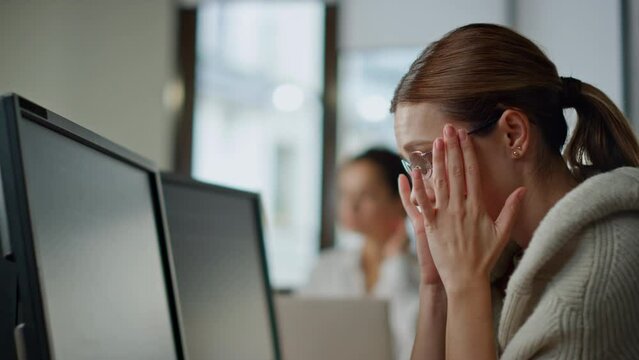 Software developer thinking solution closeup. Stressed woman programming analyze