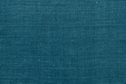 Blue green linen fabric, background or texture, top view, closeup