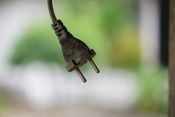 closeup of Type C Electrical Plug in blurred background.