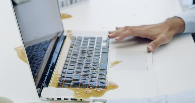 Coffee spill, laptop and business man with mess, damage and disaster on computer in workplace. Corporate, technology and hands of male worker with hot beverage accident, mistake and liquid splash
