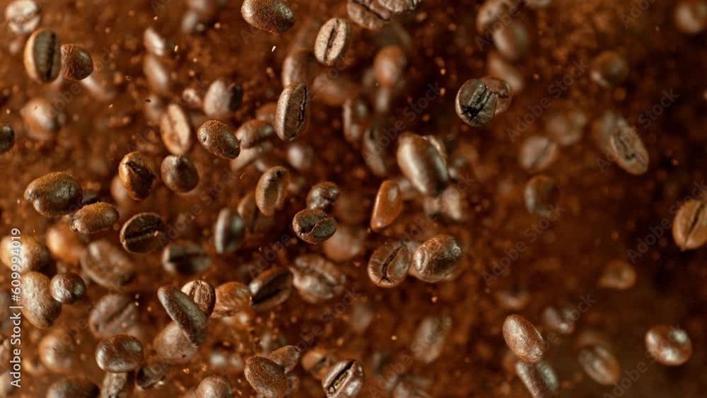 Aufkleber Super slow motion of rotating cocoa beans and powder. Filmed on high speed cinema camera, 1000 fps placed on high speed cine bot. Camera moving up with rotation. Speed ramp effect.