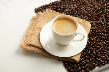 Fototapeta premium Cup of coffee and coffee beans, Isolated on a white background