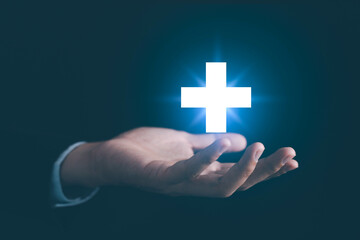 Obraz premium Businessman offer positive thing. Such as profit, Benefits, Development, Corporate Social Responsibility (CSR). Represented by plus sign.
