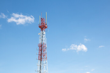 Communications tower On the building with blue Cloud sky background