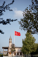 National turkish flag and a small mosque