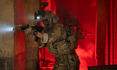 Soldier in anti-terrorist warfare in a dark building, Anti-terrorist operation training on the...