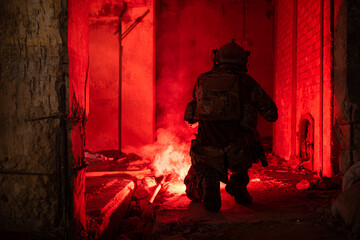 Soldier in anti-terrorist warfare in a dark building, Anti-terrorist operation training on the...