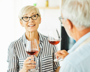 love kitchen senior glass woman couple home retirement happy food smiling husband wine together portrait
