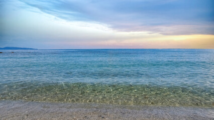 Corsica, France, transparent turquoise water on a beautiful beach in summer

