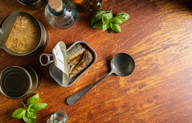 Canned fish on a table top.