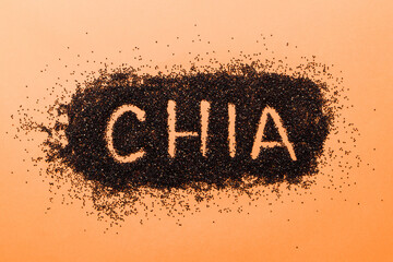 chia word made from chia seeds top view on colored background. Healthy superfood