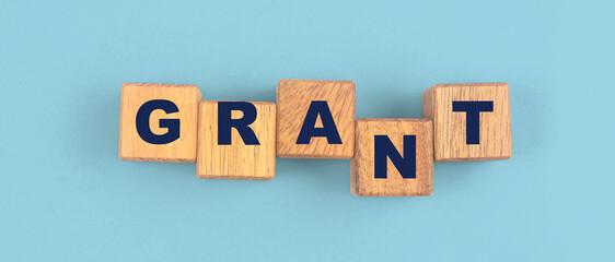 Wooden cube with the letter from the mvp word © violetkaipa