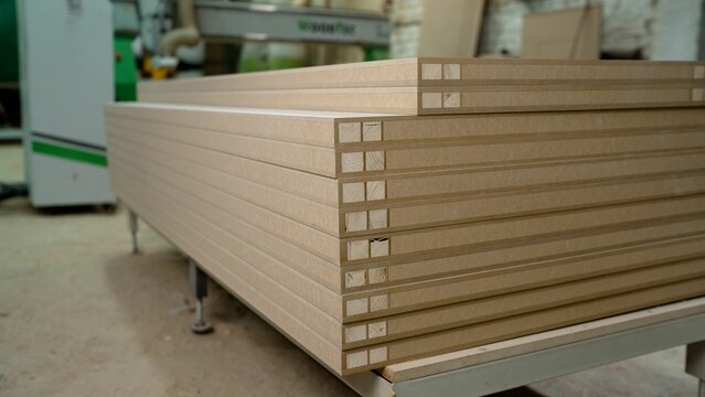 Manufacturing process of wooden doors. Folded door panels. Woodworking and joinery production. furniture manufacture. Joinery.