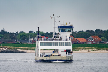 Small ferry transporting cars and people in Esbjerg Denmark to Fanø