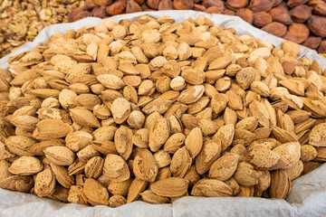 Pile of almond pits in an Asian market