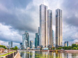 High buildings of Moscow-City at Moskva River at summer sunset, Russia.