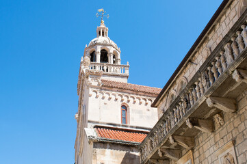 Fototapeta na wymiar Decorated bell tower of the Cathedral of St Mark in Korcula town, Croatia