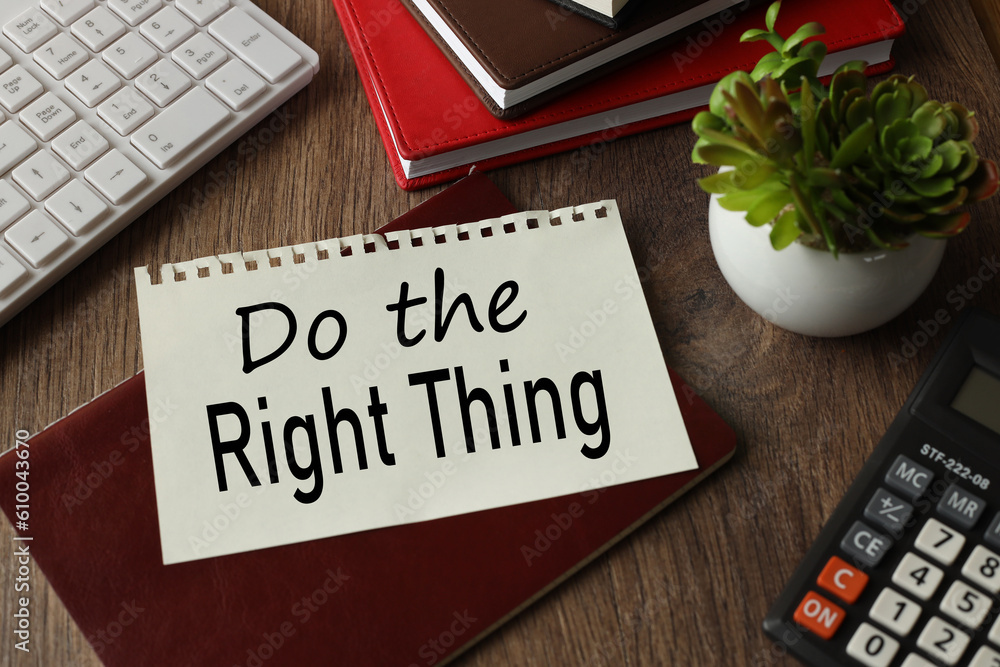 Poster do the right thing page with text. white keyboard in a pot