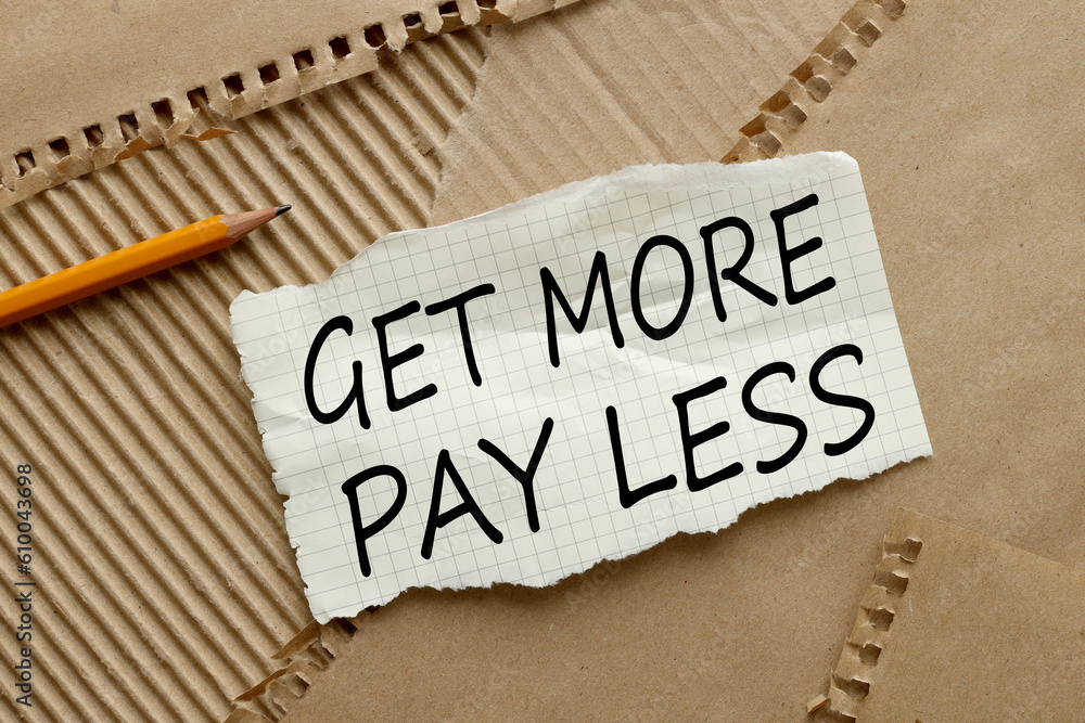 Poster get more pay less - text on torn paper on craft paper background. pencil points to text