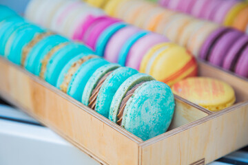 Top view delicious macarons group . French sweet bakery coffee house. Colorful macaroons display.	
