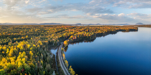 Autumn colors at Moosehead Lake - Maine - train tracks along the shoreline
