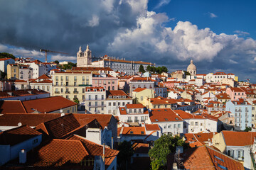 Obraz premium View of Lisbon famous postcard iconic view from Miradouro de Santa Luzia tourist viewpoint over Alfama old city district. Lisbon, Portugal.