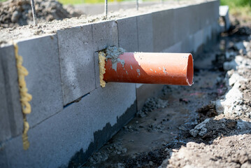 construction of house foundations - foundation strips with reinforcements and sewerage preparation,...