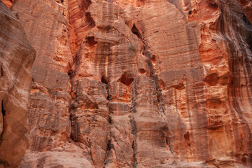 Jordan. Peter. Canyon Siq or El Siq. Sheer cliffs of a canyon or rocky cleft, 92 to 182 meters high, hang over narrow path. Only road to rock city of Nabatean kingdom, to ancient city of Petra.
