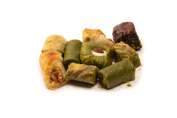 Turkish pistachio baklava isolated on a white background. A variety of turkish sweet baklava.