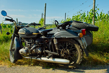 Motobike with sidecar in a vineyard
