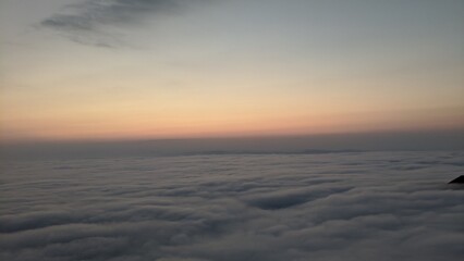 Fototapeta na wymiar Sunset: Dramatic Aerial View of Natures Beauty in Cloudscape