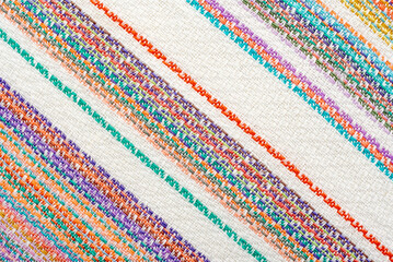 Fabric with straight colored lines made of organic cotton. Material. Textile. Canvas