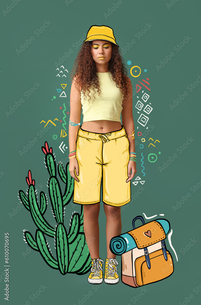 Wall mural Beautiful fashionable African-American woman in drawn clothes, cactus and backpack on green background