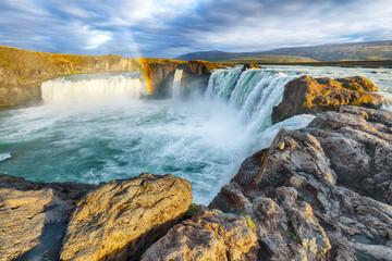 Breathtaking landscape scene of powerful Godafoss waterfall.