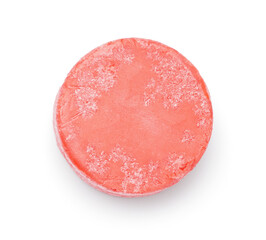 Red solid shampoo bar on white background
