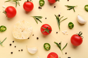 Composition with ripe cherry tomatoes, jalapeno and spices on beige background