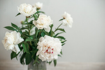 bouquet of white flowers peonies in a vase 